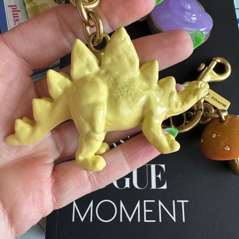 🦕 Coach Yellow Dinosaur Bag Charm 𝐒𝐨𝐥𝐝 𝐎𝐮𝐭 𝐀𝐜𝐫𝐨𝐬𝐬 𝐂𝐨𝐚𝐜𝐡! 🦕